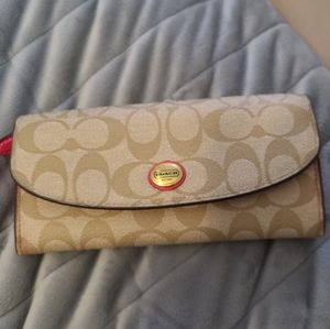 Coach tan and pink wallet